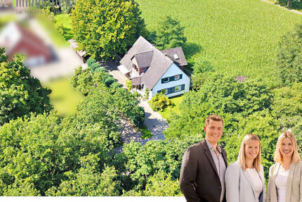 Nah an der Natur und doch dicht an Barßel: Wohnhaus im Grünen mit großem Grundstück!