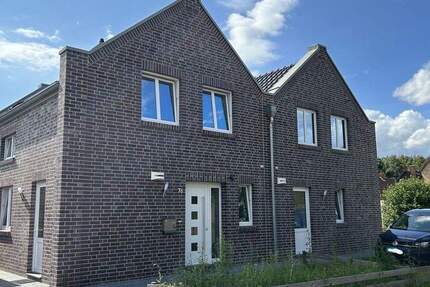 Wohnen mit Lebensqualität - Doppelhaushälfte in zentraler Lage von Apen 4 zimmer