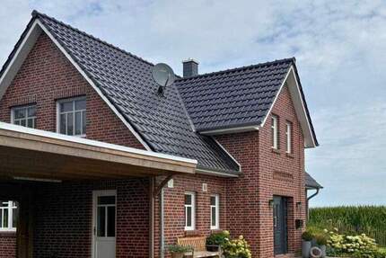 Tradition trifft Moderne - Neubau Einfamileinhaus mit Friesengiebel in Ofenerdiek 5 zimmer