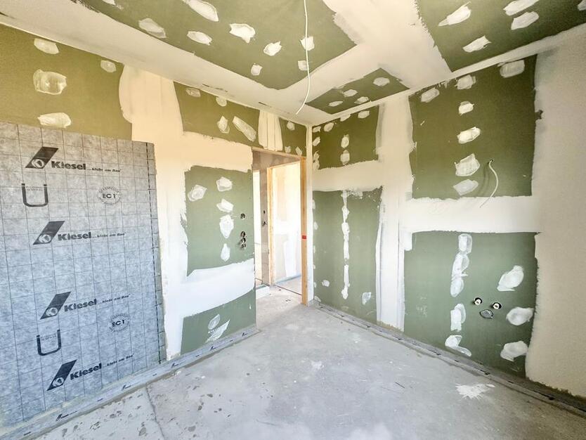 Rastede - Im Göhlen: Neubau-Reihenmittelhaus mit Einbauküche als Erstbezug zimmer