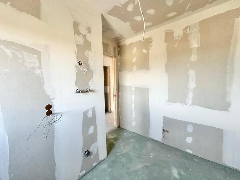 Rastede - Im Göhlen: Neubau-Reihenmittelhaus mit Einbauküche als Erstbezug zimmer
