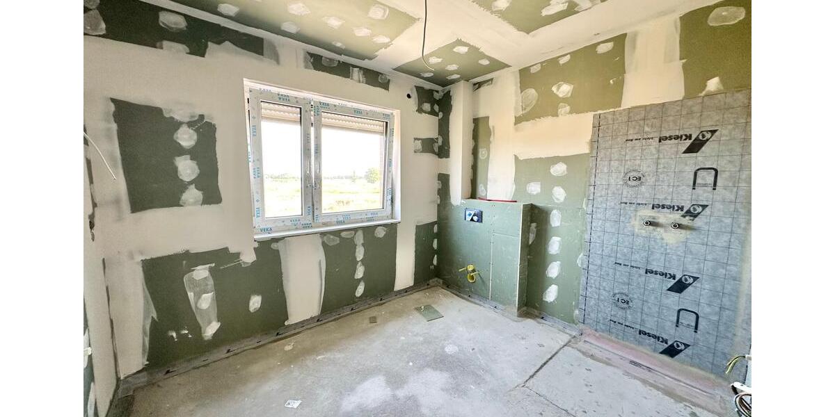 Rastede - Im Göhlen: Neubau-Reihenmittelhaus mit Einbauküche als Erstbezug 5 zimmer