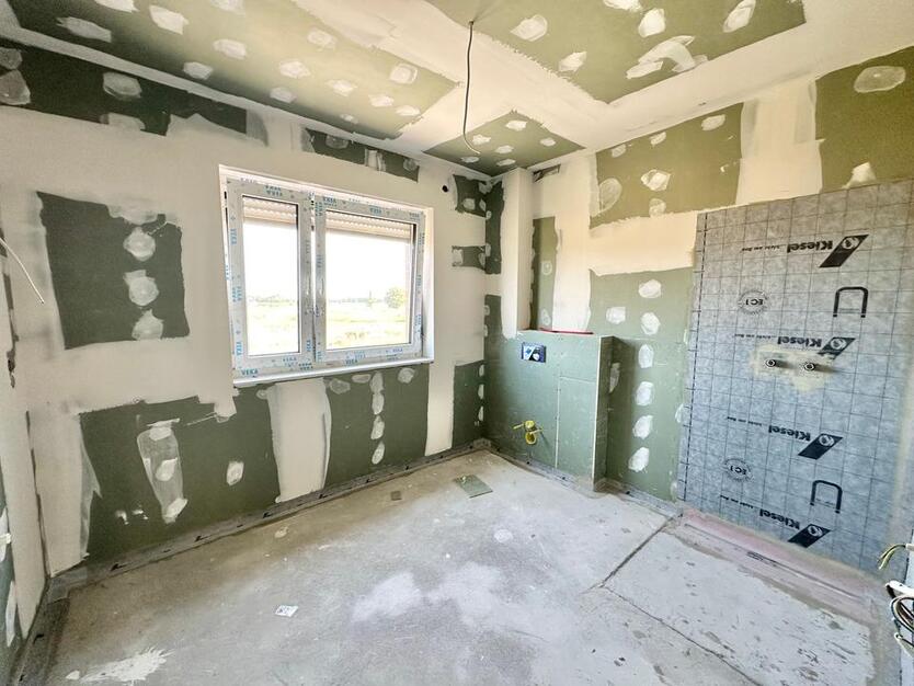 Rastede - Im Göhlen: Neubau-Reihenmittelhaus mit Einbauküche als Erstbezug zimmer