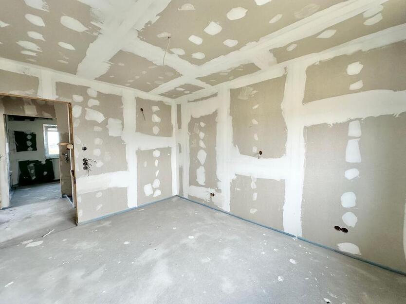 Rastede - Im Göhlen: Neubau-Reihenendhaus mit Einbauküche als Erstbezug zimmer