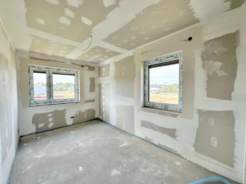 Rastede - Im Göhlen: Neubau-Reihenmittelhaus mit Einbauküche als Erstbezug zimmer