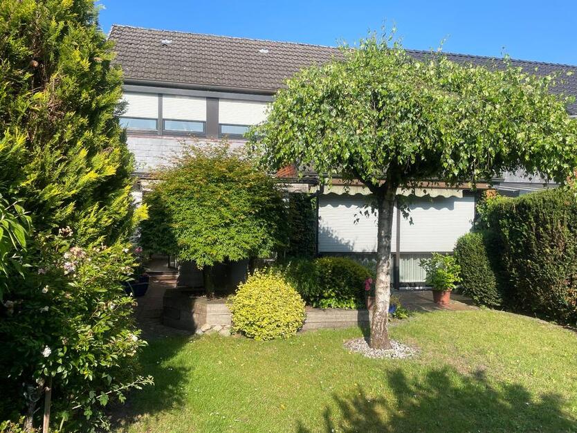 Reihenmittelhaus mit Garten top gepflegt, Garage