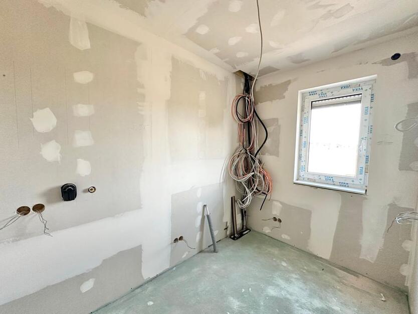 Rastede - Im Göhlen: Neubau-Reihenendhaus mit Einbauküche als Erstbezug zimmer