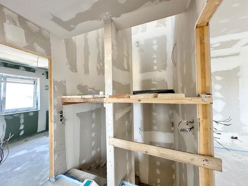 Rastede - Im Göhlen: Neubau-Reihenmittelhaus mit Einbauküche als Erstbezug zimmer