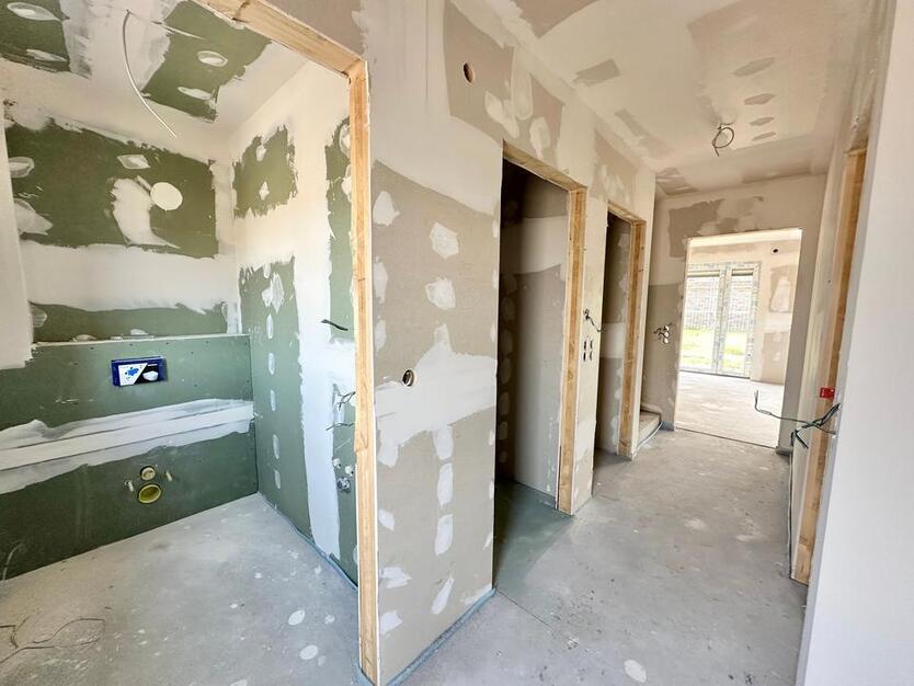 Rastede - Im Göhlen: Neubau-Reihenendhaus mit Einbauküche als Erstbezug zimmer