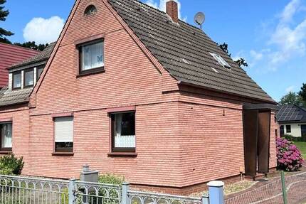 PURNHAGEN-ImmobilieN - Freistehendes Einfamilienhaus auf großem Grundstück in ruhiger Nebenstraße von Rekum!