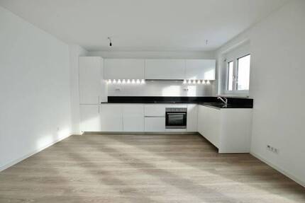 Moderne 3.5-ZWG mit Dachterrasse & Einbauküche im Riedpark