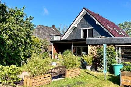 Kernsaniertes Einfamilienhaus mit Doppelgarage und Blick ins Grüne am Ortsrand von Rastede (Obj.-Nr.: 6567) 6 zimmer